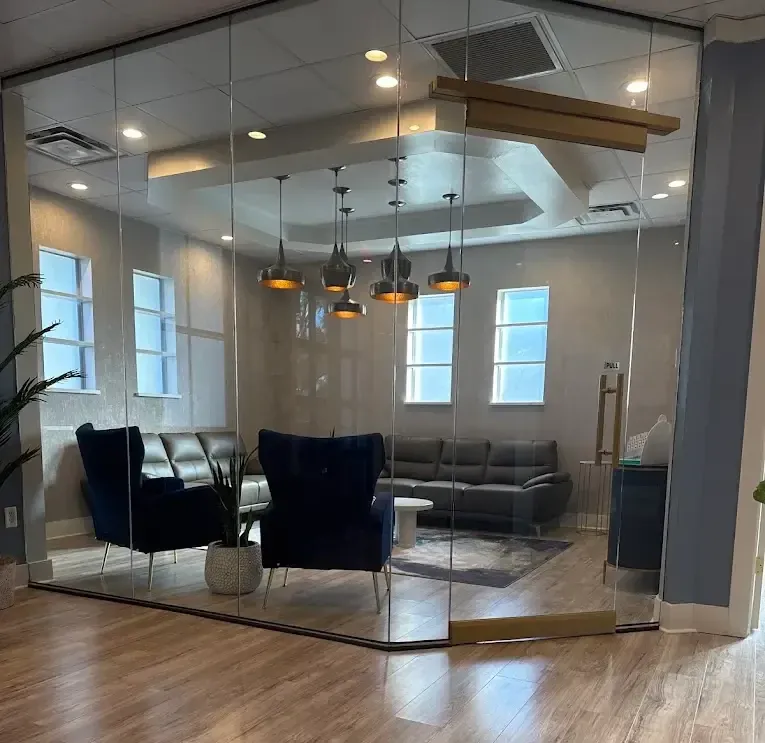 EVO Medical Spa glass-walled reception and waiting room
